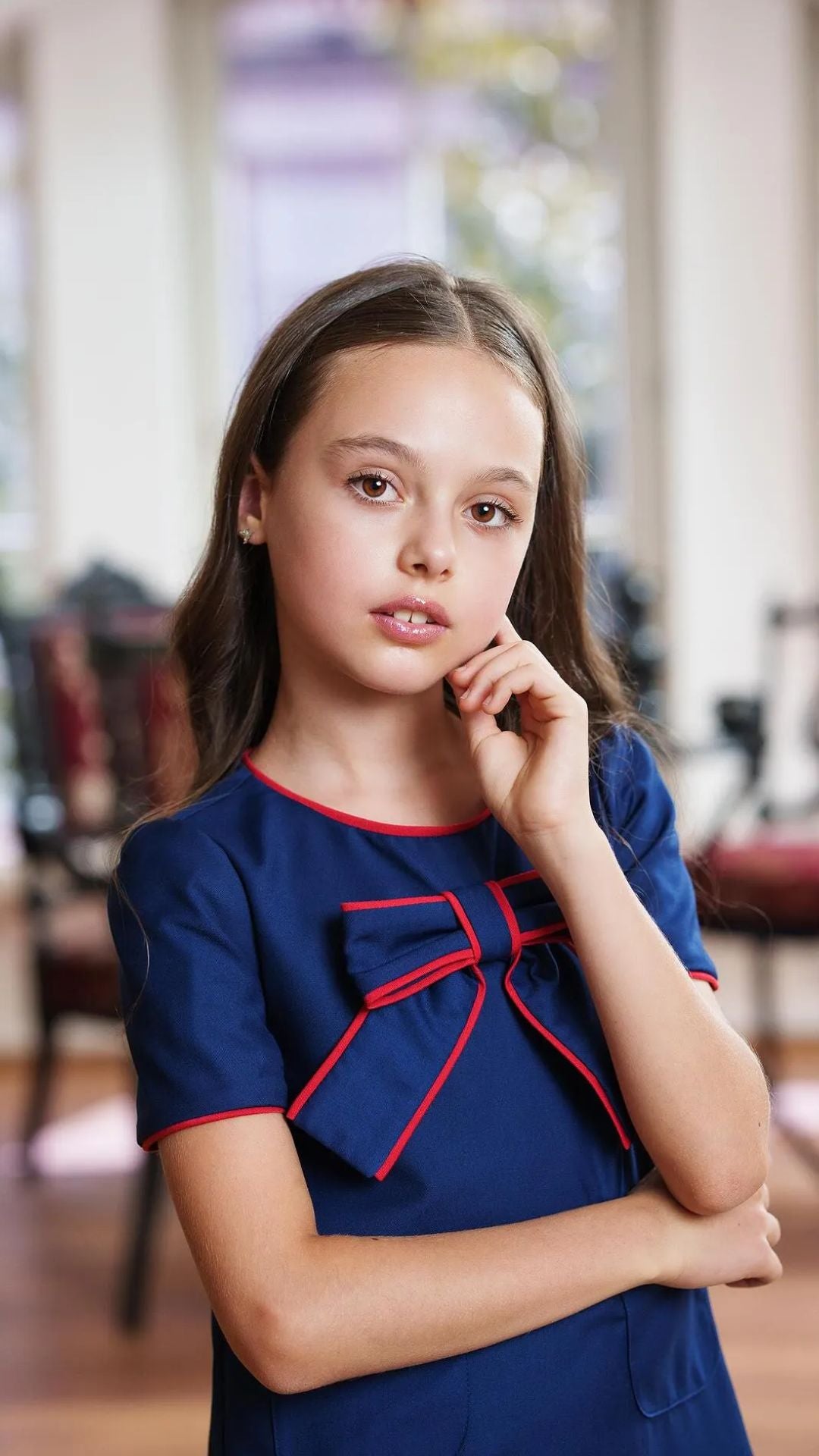 Girls’ Navy Blue Pleated Dress with Red Trim & Bow