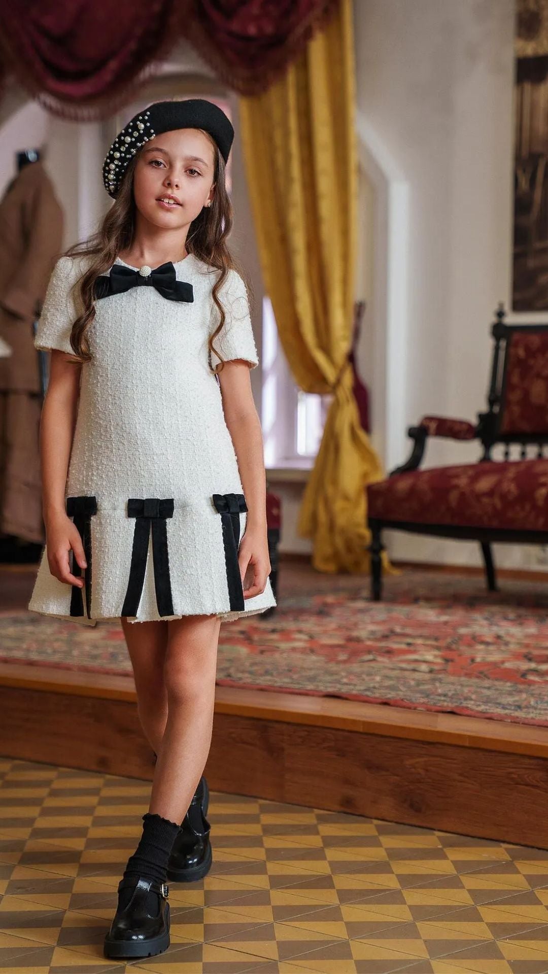 Girls’ White Bouclé Dress with Black Velvet Bows & Pearl Detail